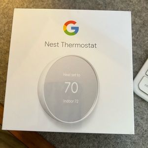 NWT Google Nest Thermostat. Brand new - never opened.